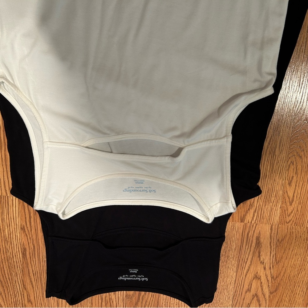 2 Soft Surroundings Sleeveless Tunic with cut out
One black and one white - Picture 6 of 8